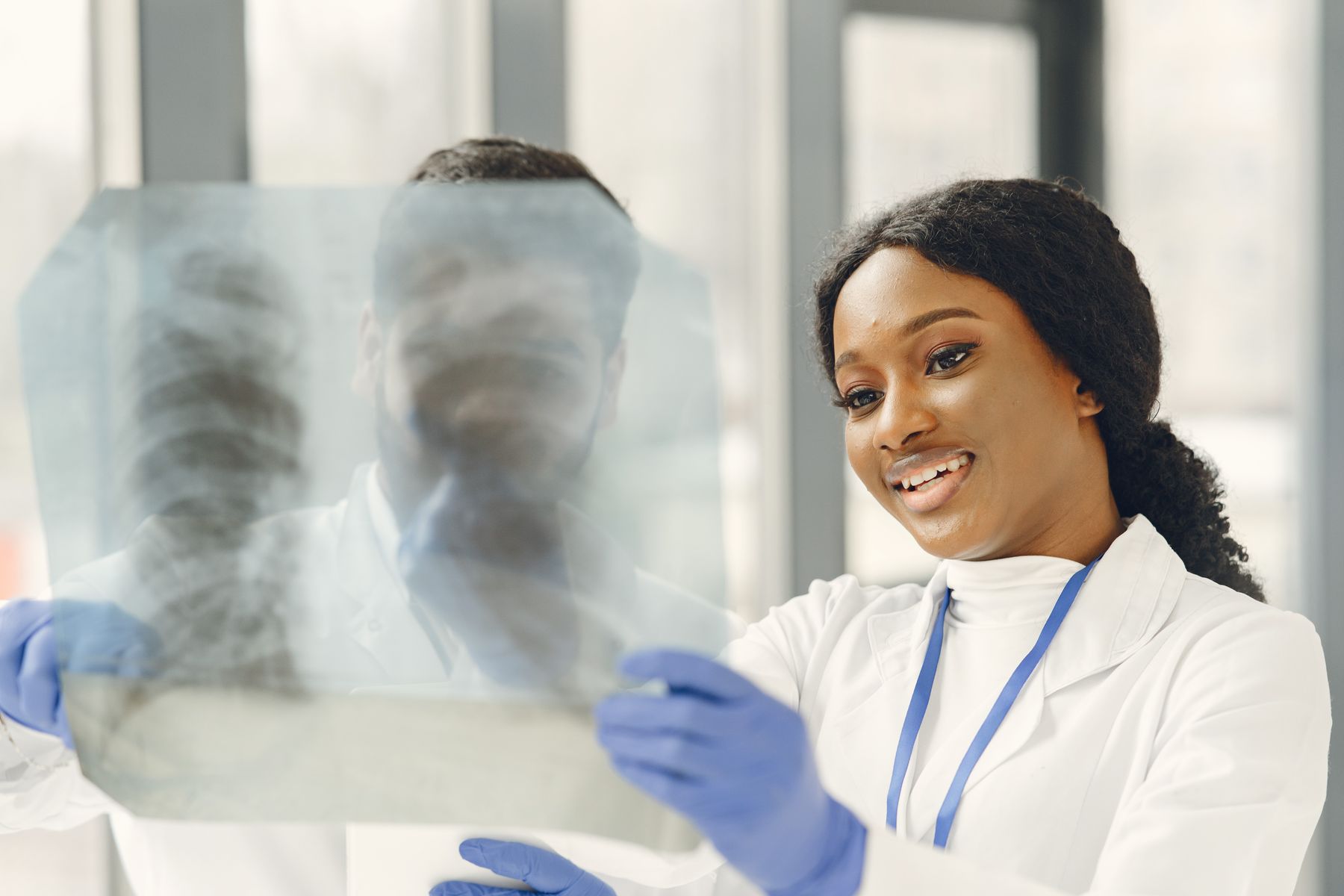 Two clinicians reviewing diagnostic imaging together